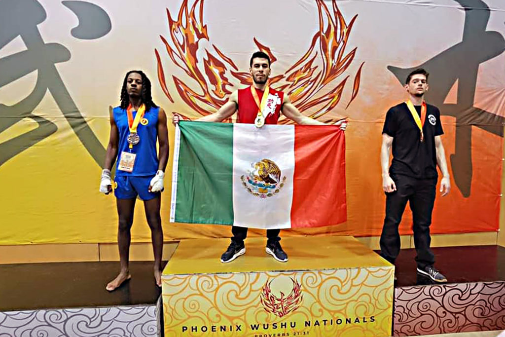 El representante de México y de Baja California Sur venció, coronándose campeón, por unanimidad al competidor de Bermuda, en la categoría de 65 kg